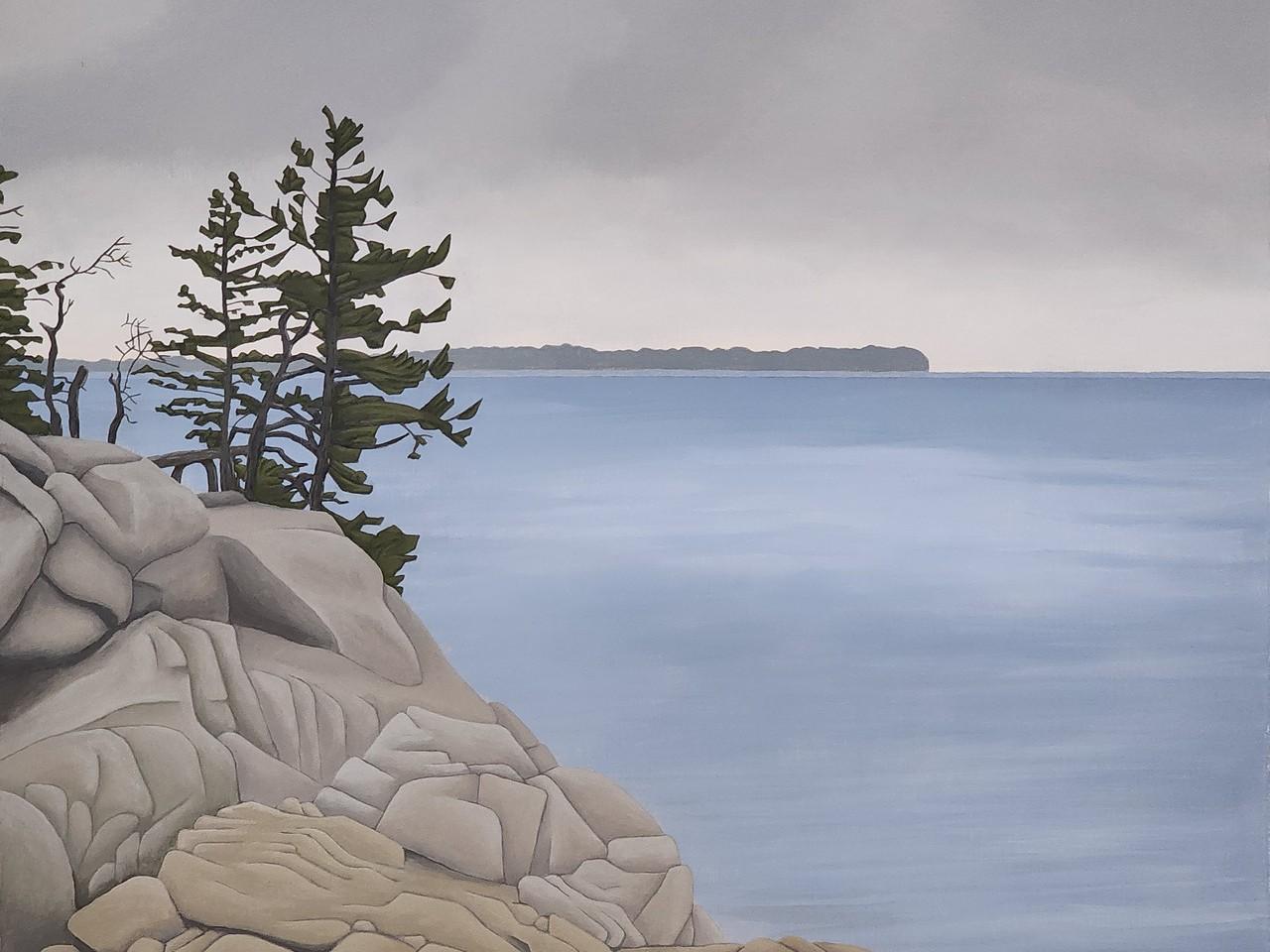 This is a painting of a coastal scene on a cloudy day. The foreground is dominated by a large, weathered rock formation, depicted in shades of light grey, tan, and beige. The rocks are chunky and angular, with visible striations and indentations suggesting erosion. Several evergreen trees with dark green foliage and slender, dark brown trunks grow from the top of the rock formation, leaning slightly towards the right. One of the trees has bare, twiggy branches extending from its left side.