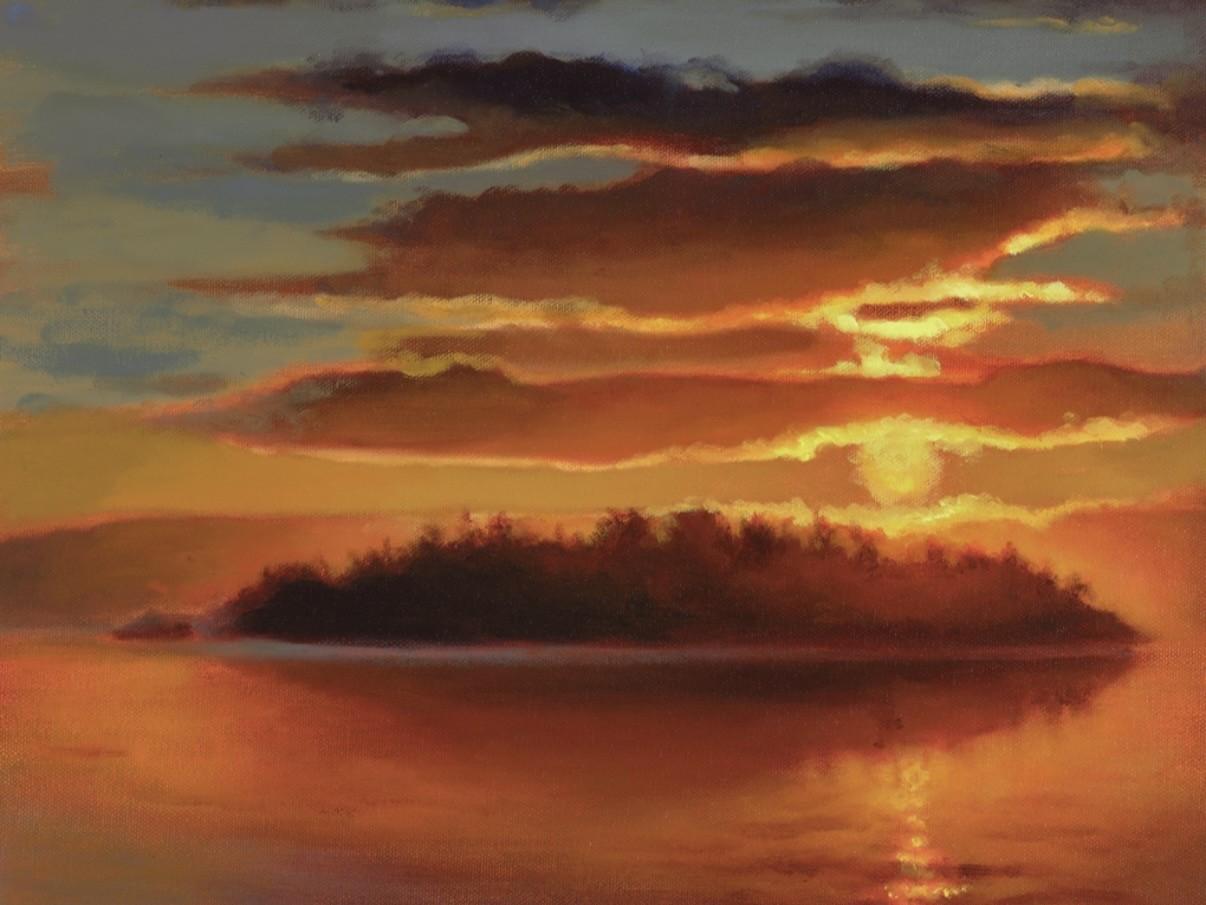 This is a painterly depiction of a sunset over water, with a small island silhouetted against the vibrant sky. The scene is dominated by warm colors, primarily oranges, yellows, and reds, with accents of blue and purple in the upper sky and darker tones for the island and its reflection.
